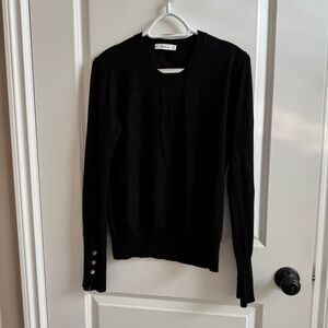 Zara knit Black Sweater with Button Detail on sleeves.